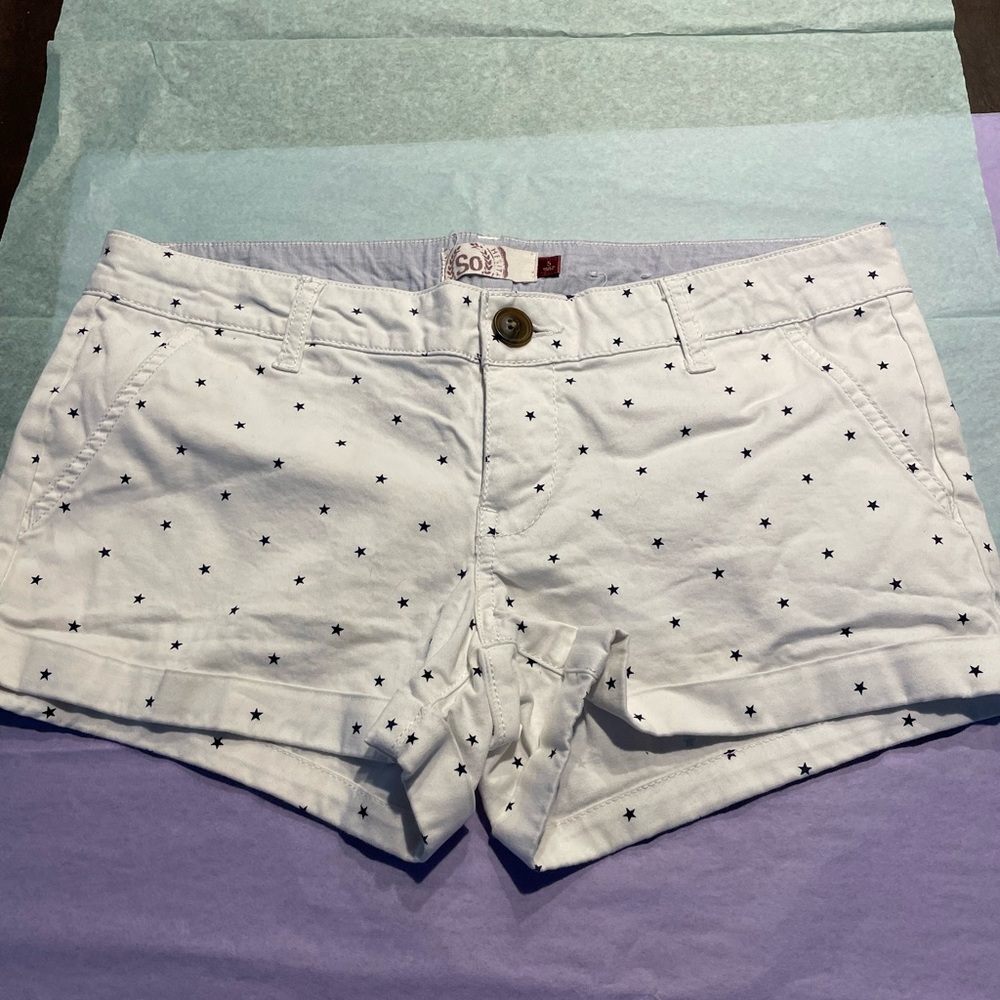 white junior’s shorts with blue stars, size 5